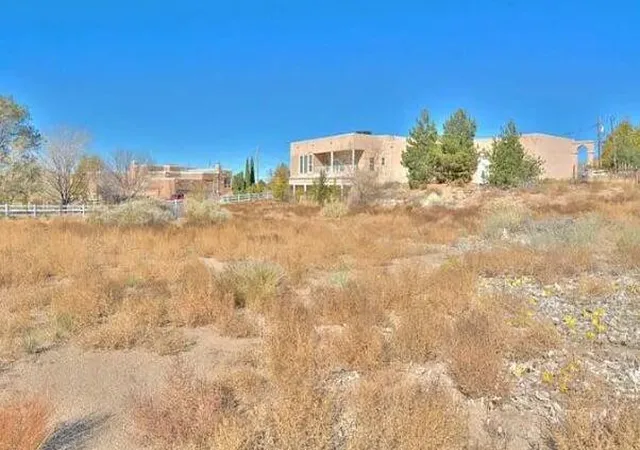 Photo 2 of Single family home for sale at 12050 Holly Ave Ne, Albuquerque, NM 87122 | MLS# 1110479 | Listing updated on 2026-09-12