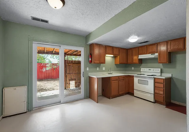Photo 3 of Condo for sale at 8201 Trumbull Ave Se #APT B, Albuquerque, NM 87108 | MLS# 1110489 | Listing updated on 2026-09-07