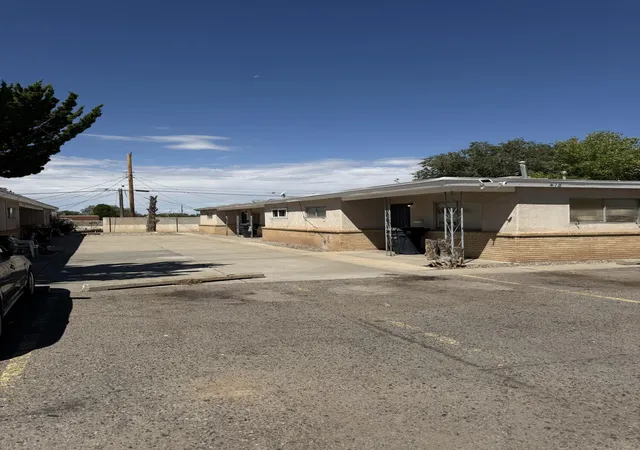 Photo 2 of Multi family home for sale at 411 Virginia St Ne, Albuquerque, NM 87108 | MLS# 1110496 | Listing updated on 2026-09-05