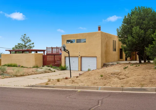 Photo 3 of Single family home for sale at 14326 Oakwood Pl Ne, Albuquerque, NM 87123 | MLS# 1110537 | Listing updated on 2026-09-06