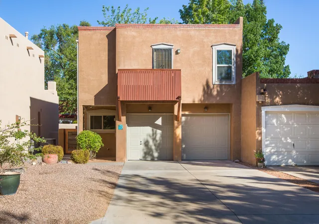 Photo 2 of Townhouse for sale at 3036 Sombra Del Rio Nw, Albuquerque, NM 87107 | MLS# 1110810 | Listing updated on 2026-09-21