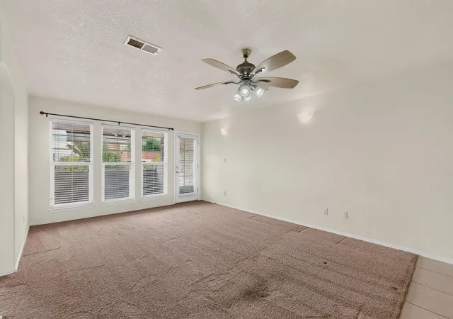 Photo 3 of Townhouse for sale at 4909 Sereno Dr NE, Albuquerque, NM 87111 | MLS# 1111282 | Listing updated on 2026-09-21