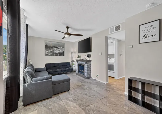 Photo 2 of Townhouse for sale at 609 Grecian Ln NW, Albuquerque, NM 87107 | MLS# 1111314 | Listing updated on 2026-09-21