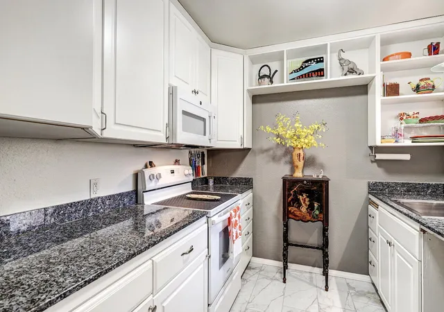 Photo 3 of Condo for sale at 1821 Dartmouth Dr Ne #104, Albuquerque, NM 87106 | MLS# 1111365 | Listing updated on 2026-10-01