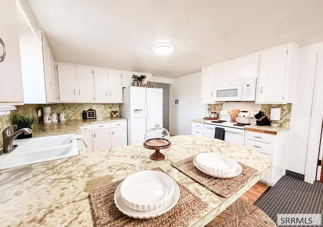 Photo 3 of Single family home for sale at 1455 Clark Dr, Idaho Falls, ID 83404 | MLS# 2189178 | Listing updated on 2026-09-11
