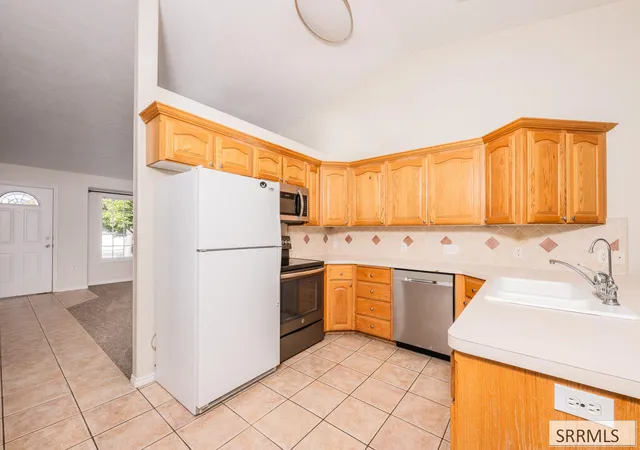Photo 3 of Multi family home for sale at 1233 Hoopes Ave, Idaho Falls, ID 83404 | MLS# 2189828 | Listing updated on 2026-10-14