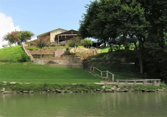 Photo 2 of Mansion for sale at 163 El Camino River Rd, Bastrop, TX 78602 | MLS# 8806171 | Listing updated on 2026-09-14