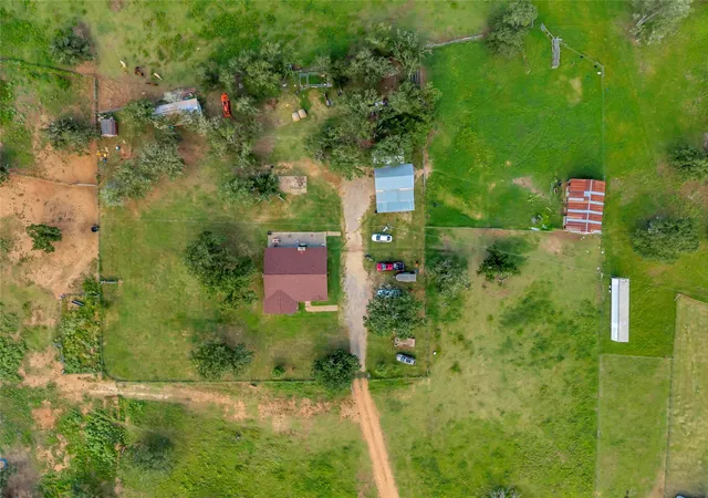 Photo 2 of Single family home for sale at 1080 League Line Rd, Paige, TX 78659 | MLS# 7815730 | Listing updated on 2026-09-11