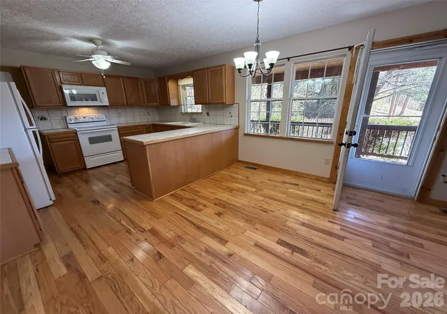 Photo 3 of Single family home for sale at 215 Pinellas Ln, Waynesville, NC 28785 | MLS# 4351510 | Listing updated on 2026-09-14
