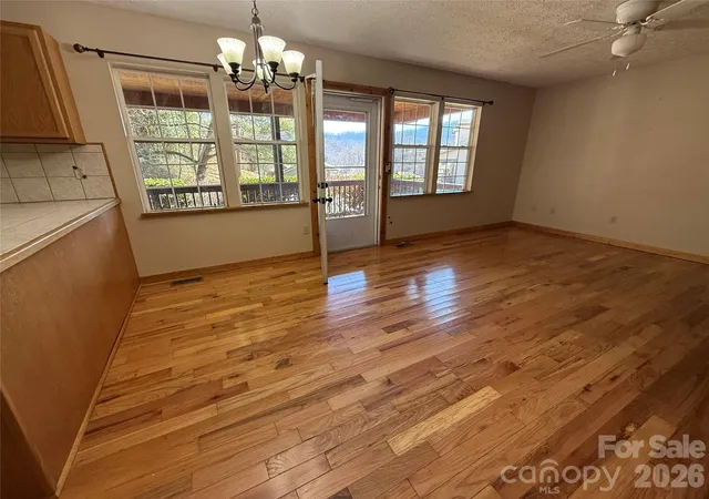 Photo 4 of Single family home for sale at 215 Pinellas Ln, Waynesville, NC 28785 | MLS# 4351510 | Listing updated on 2026-09-14