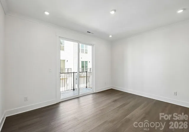 Photo 3 of Townhouse for sale at 1131 Kokomo Ln, Charlotte, NC 28206 | MLS# 4376206 | Listing updated on 2026-09-13
