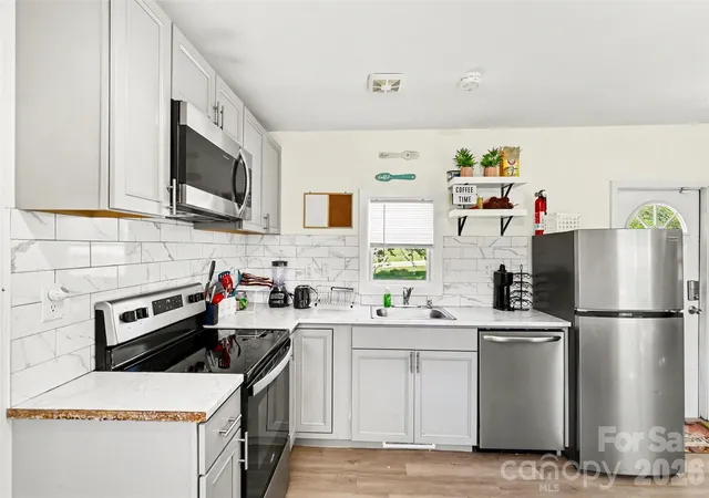 Photo 3 of Single family home for sale at 9937 Harwood Ln, Charlotte, NC 28214 | MLS# 4378200 | Listing updated on 2026-09-23