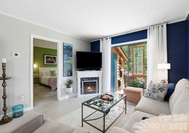 Photo 1 of Condo for sale at 581 Courtwood Ln #4, Hendersonville, NC 28739 | MLS# 4388262 | Listing updated on 2026-09-15