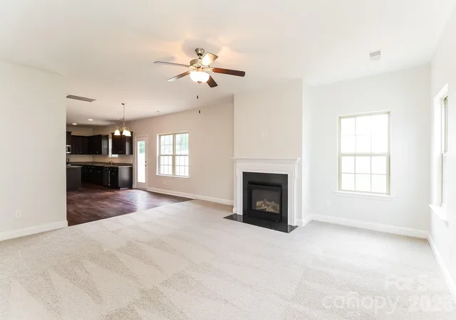 Photo 3 of Single family home for sale at 205 Taylors Crk St, Mount Holly, NC 28120 | MLS# 4393726 | Listing updated on 2026-09-11
