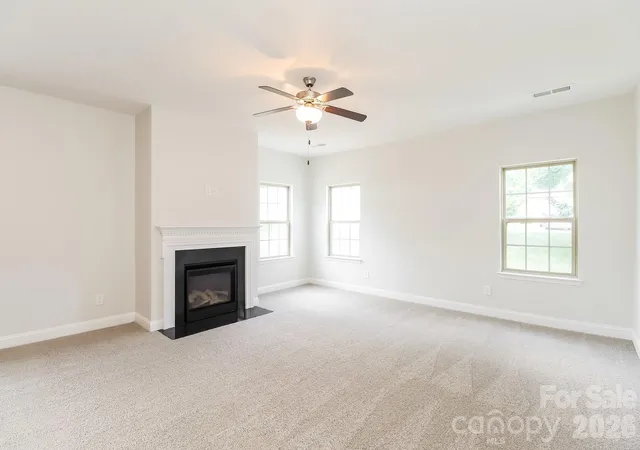 Photo 3 of Single family home for sale at 205 Taylors Crk St, Mount Holly, NC 28120 | MLS# 4393726 | Listing updated on 2026-09-11