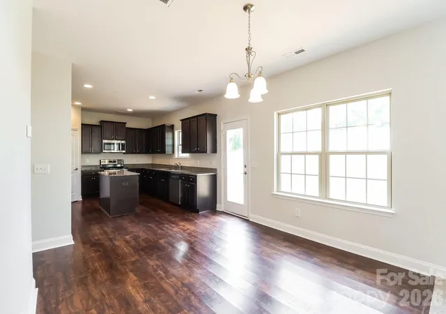 Photo 4 of Single family home for sale at 205 Taylors Crk St, Mount Holly, NC 28120 | MLS# 4393726 | Listing updated on 2026-09-11