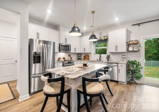 Photo 3 of Single family home for sale at 1002 Westminster Dr, Statesville, NC 28677 | MLS# 4400811 | Listing updated on 2026-09-24