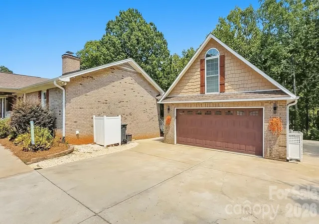 Photo 3 of Single family home for sale at 107 Mistywood Dr, Mount Holly, NC 28120 | MLS# 4400826 | Listing updated on 2026-09-12