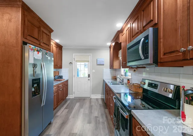 Photo 4 of Single family home for sale at 1501 Old Hickory Grv Rd, Mount Holly, NC 28120 | MLS# 4403657 | Listing updated on 2026-09-27