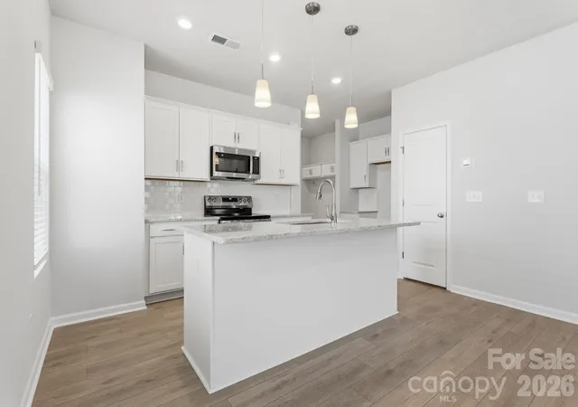 Photo 3 of Townhouse for sale at 4618 Lakeview Rd, Charlotte, NC 28216 | MLS# 4406136 | Listing updated on 2026-09-14