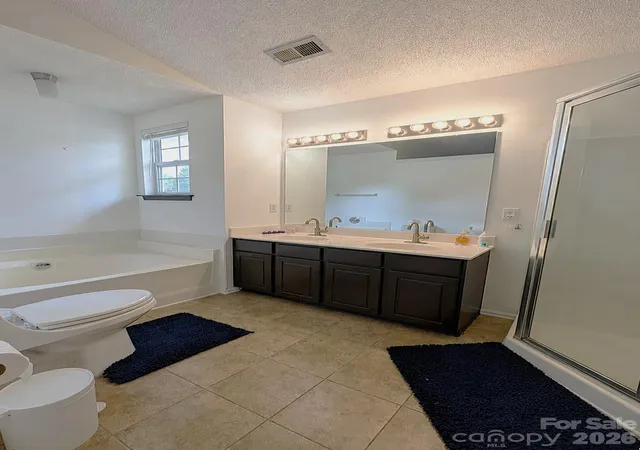 Photo 4 of Single family home for sale at 9026 Shenington Pl, Charlotte, NC 28216 | MLS# 4406928 | Listing updated on 2026-10-21