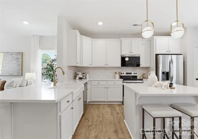 Photo 1 of Townhouse for sale at 3306 Campbell Dr, Charlotte, NC 28205 | MLS# 4407175 | Listing updated on 2026-09-12