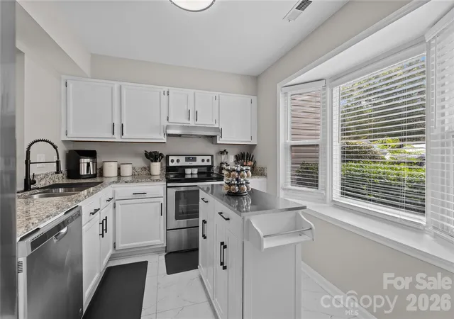 Photo 2 of Townhouse for sale at 8407 Rust Wood Pl, Charlotte, NC 28227 | MLS# 4415712 | Listing updated on 2026-10-04