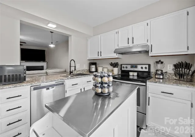 Photo 3 of Townhouse for sale at 8407 Rust Wood Pl, Charlotte, NC 28227 | MLS# 4415712 | Listing updated on 2026-10-04