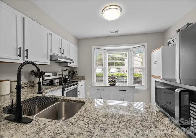 Photo 4 of Townhouse for sale at 8407 Rust Wood Pl, Charlotte, NC 28227 | MLS# 4415712 | Listing updated on 2026-10-04