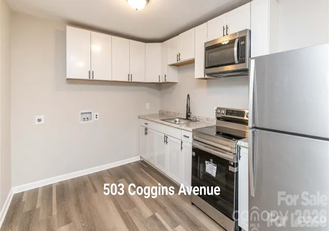 Photo 3 of Multi family home for sale at 503 Coggins Avenue, Albemarle, NC 28001 | MLS# 4417579 | Listing updated on 2026-09-21