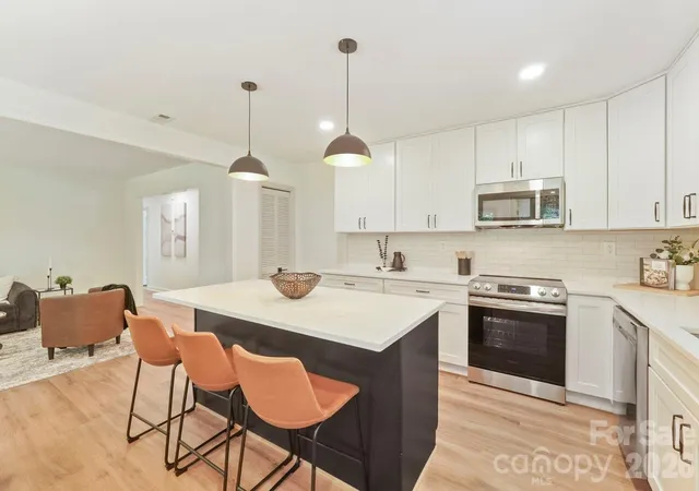 Photo 3 of Single family home for sale at 900 Burtonwood Cir, Charlotte, NC 28212 | MLS# 4419156 | Listing updated on 2026-10-01