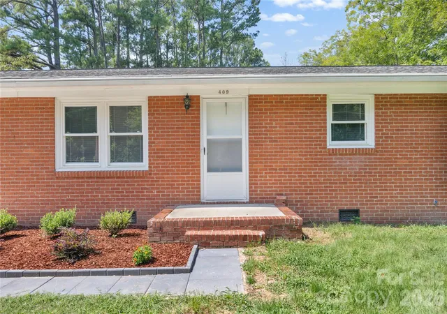 Photo 2 of Single family home for sale at 409 Moss Springs Rd, Albemarle, NC 28001 | MLS# 4420748 | Listing updated on 2026-09-12