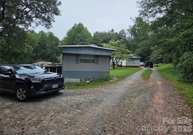 Photo 1 of Multi family home for sale at 2116 Fox Mountain Rd, Columbus, NC 28722 | MLS# 4424497 | Listing updated on 2026-09-15