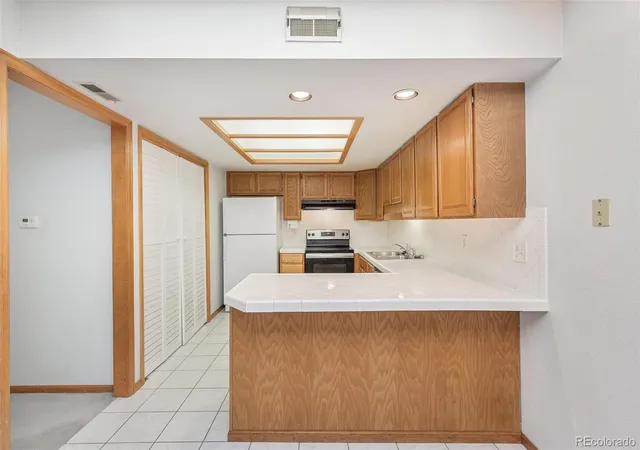 Photo 4 of Townhouse for sale at 1350 S Idalia St #G, Aurora, CO 80017 | MLS# 5247663 | Listing updated on 2026-10-23