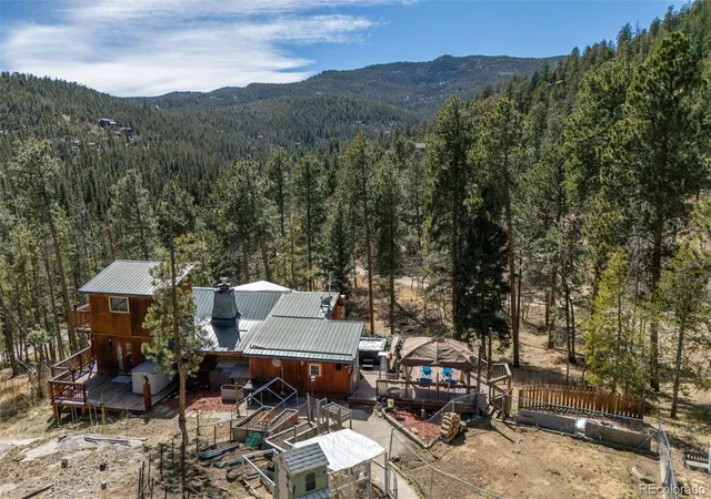 Photo 2 of Sale Pending at 10116 Sprucedale Dr, Conifer, CO 80433 | MLS# 3573361 | Listing updated on 2026-09-10
