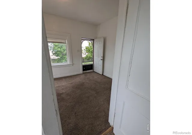 Listing Photo 4 - Condo for sale in building located at 404-406 Kochia Wy, Sterling, CO 80751