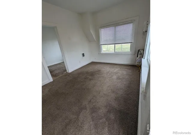 Listing Photo 5 - Condo for sale in building located at 404-406 Kochia Wy, Sterling, CO 80751