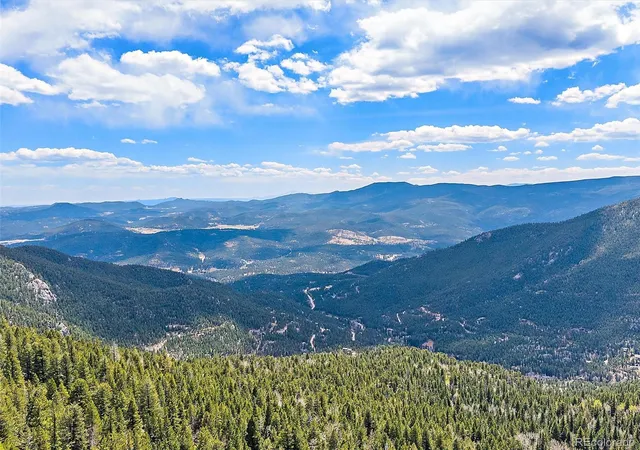 Photo 3 of Single family home for sale at 1406 Sinton Rd, Evergreen, CO 80439 | MLS# 8357364 | Listing updated on 2026-09-30