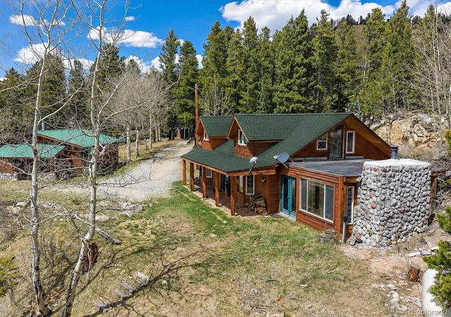 Photo 4 of Single family home for sale at 1406 Sinton Rd, Evergreen, CO 80439 | MLS# 8357364 | Listing updated on 2026-09-30