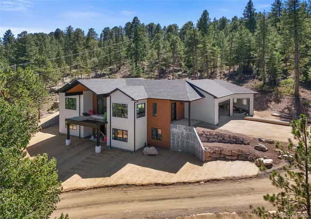Photo 2 of Single family home for sale at 5815 Herzman Dr, Evergreen, CO 80439 | MLS# 6188659 | Listing updated on 2026-09-25