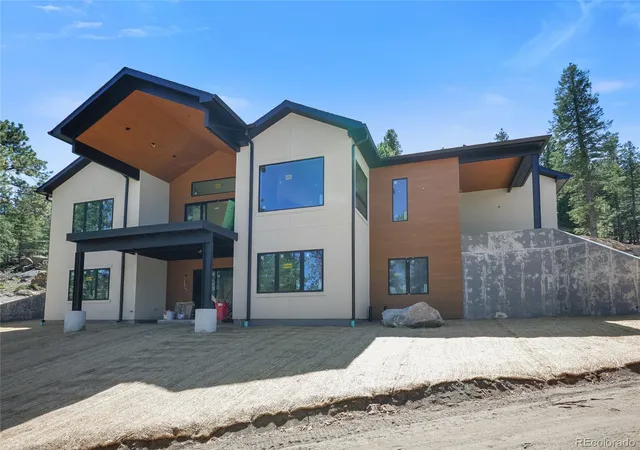 Photo 3 of Single family home for sale at 5815 Herzman Dr, Evergreen, CO 80439 | MLS# 6188659 | Listing updated on 2026-09-25