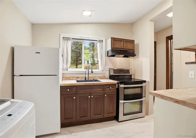 Photo 4 of Single family home for sale at 14032 S Olive Ave, Pine, CO 80470 | MLS# 5287987 | Listing updated on 2026-09-28