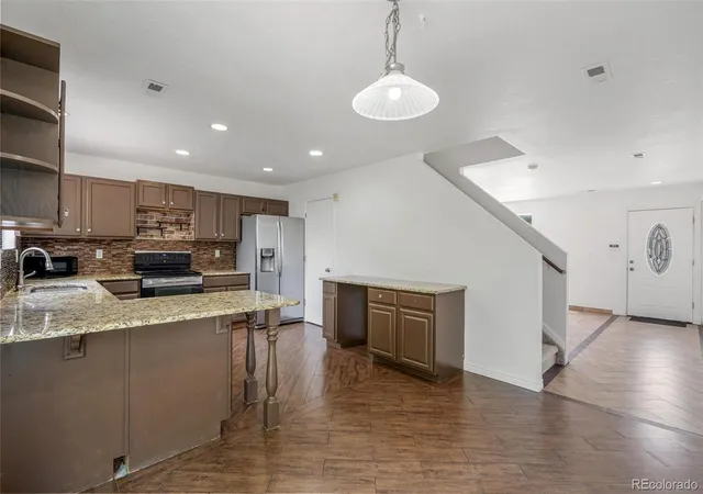 Single family home for sale at 1419 Swan Ave, Brighton, CO 80601 | MLS# 4409661