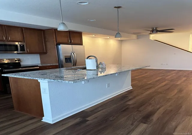 Photo 3 of Townhouse for sale at 18119 E 96th Avenue, Commerce City, CO 80022 | MLS# 7318781 | Listing updated on 2026-09-25