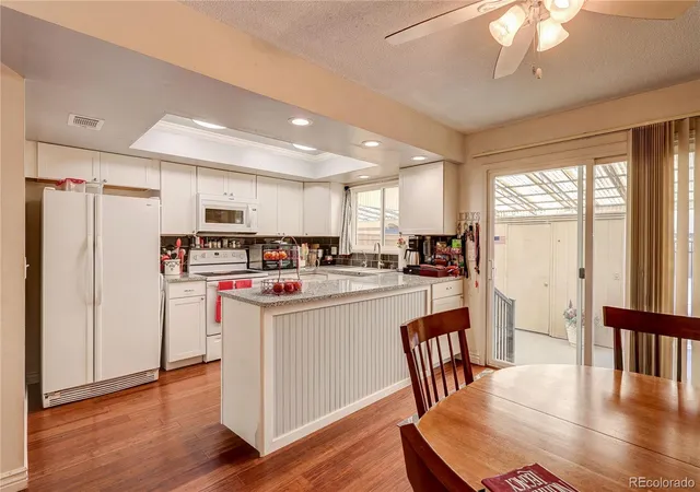 Photo 3 of Townhouse for sale at 3935 S Boston, Denver, CO 80237 | MLS# 5209794 | Listing updated on 2026-09-14