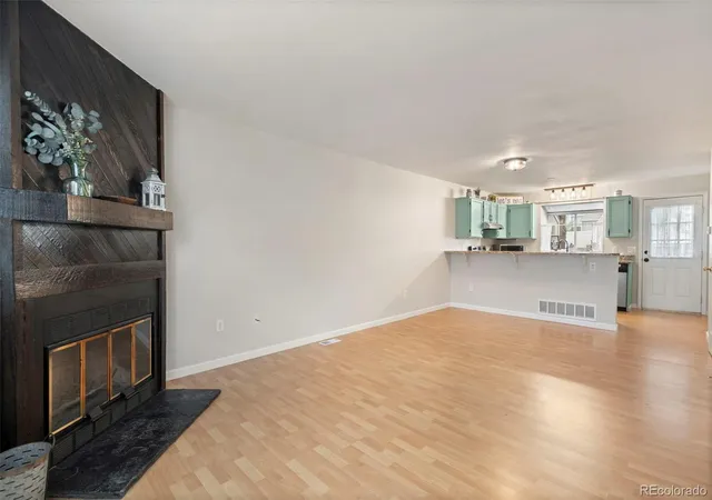 Listing Photo 4 - Condo for sale in building located at 9709 W Chatfield Ave, Littleton, CO 80128 - Unit #E