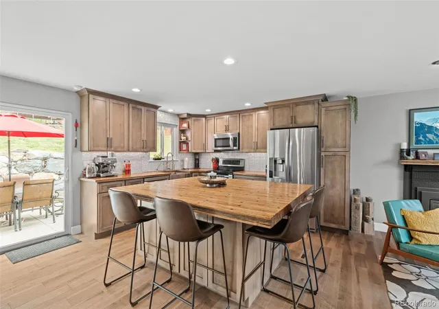 Photo 3 of Single family home for sale at 5553 Maggie Ln, Evergreen, CO 80439 | MLS# 7534612 | Listing updated on 2026-09-23