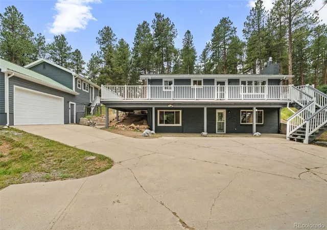 Photo 2 of Single family home for sale at 5553 Maggie Ln, Evergreen, CO 80439 | MLS# 7534612 | Listing updated on 2026-09-23