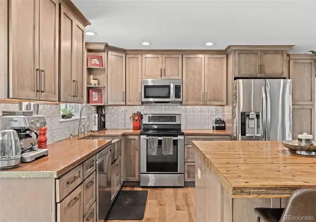 Photo 3 of Single family home for sale at 5553 Maggie Ln, Evergreen, CO 80439 | MLS# 7534612 | Listing updated on 2026-09-23