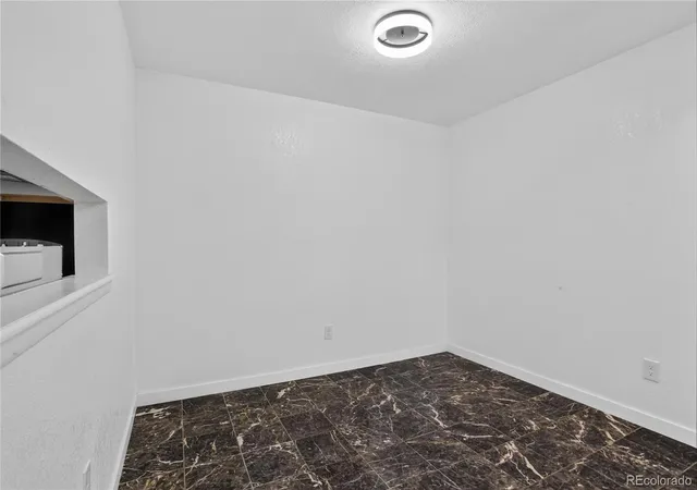 Listing Photo 4 - Condo for sale in building located at 14226 E 1st Dr, Aurora, CO 80011 - Unit #C03